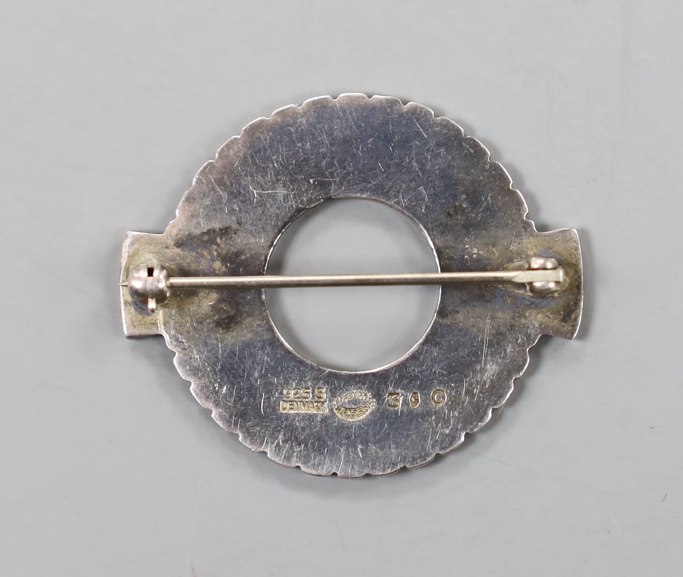 A Georg Jensen sterling 925 studio art brooch, of openwork circular form, design no. 310, 33mm.